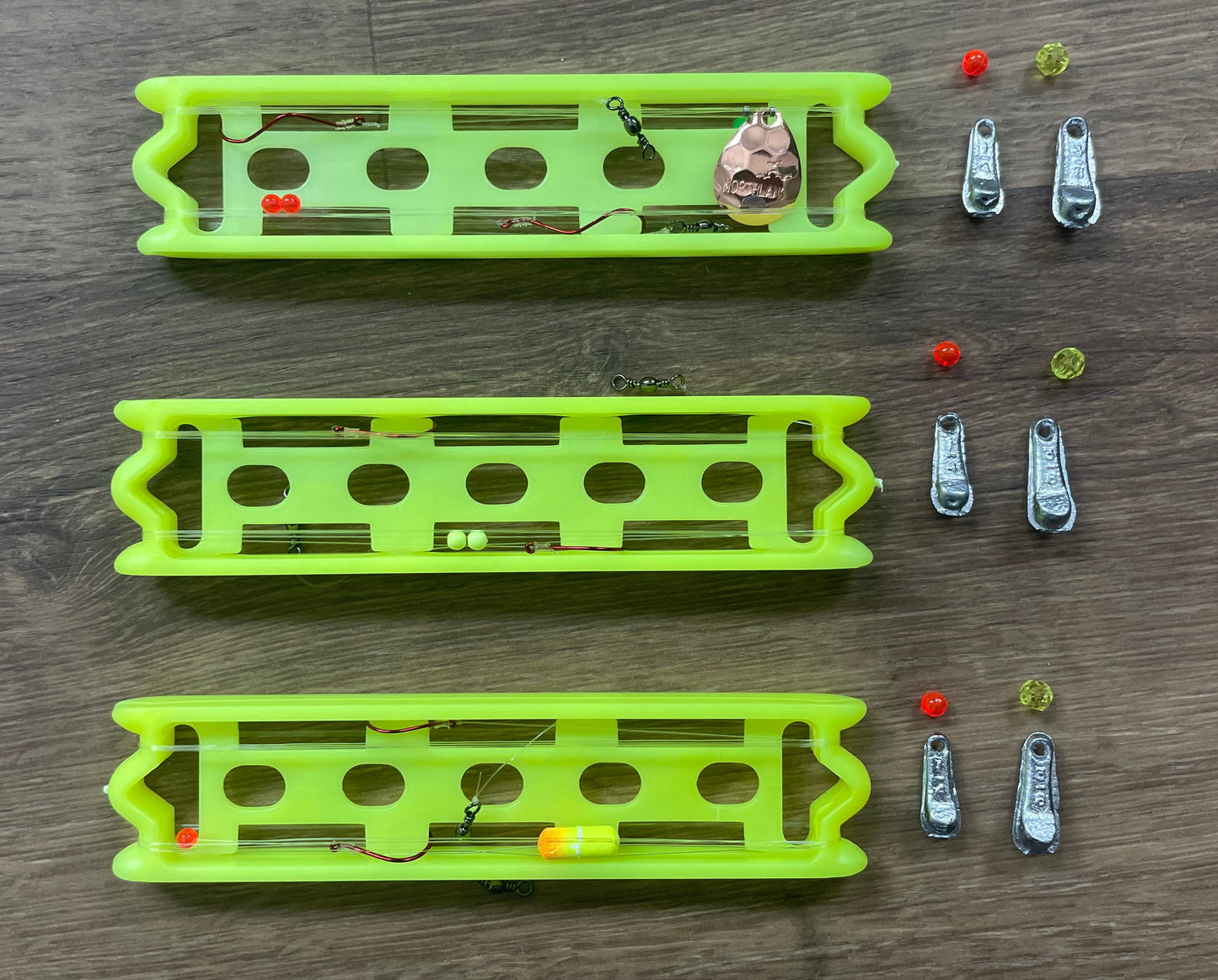 Picture of 6 rigs included in kit (Lindy rigs and worm harnesses) plus walking sinker and bead hardware.