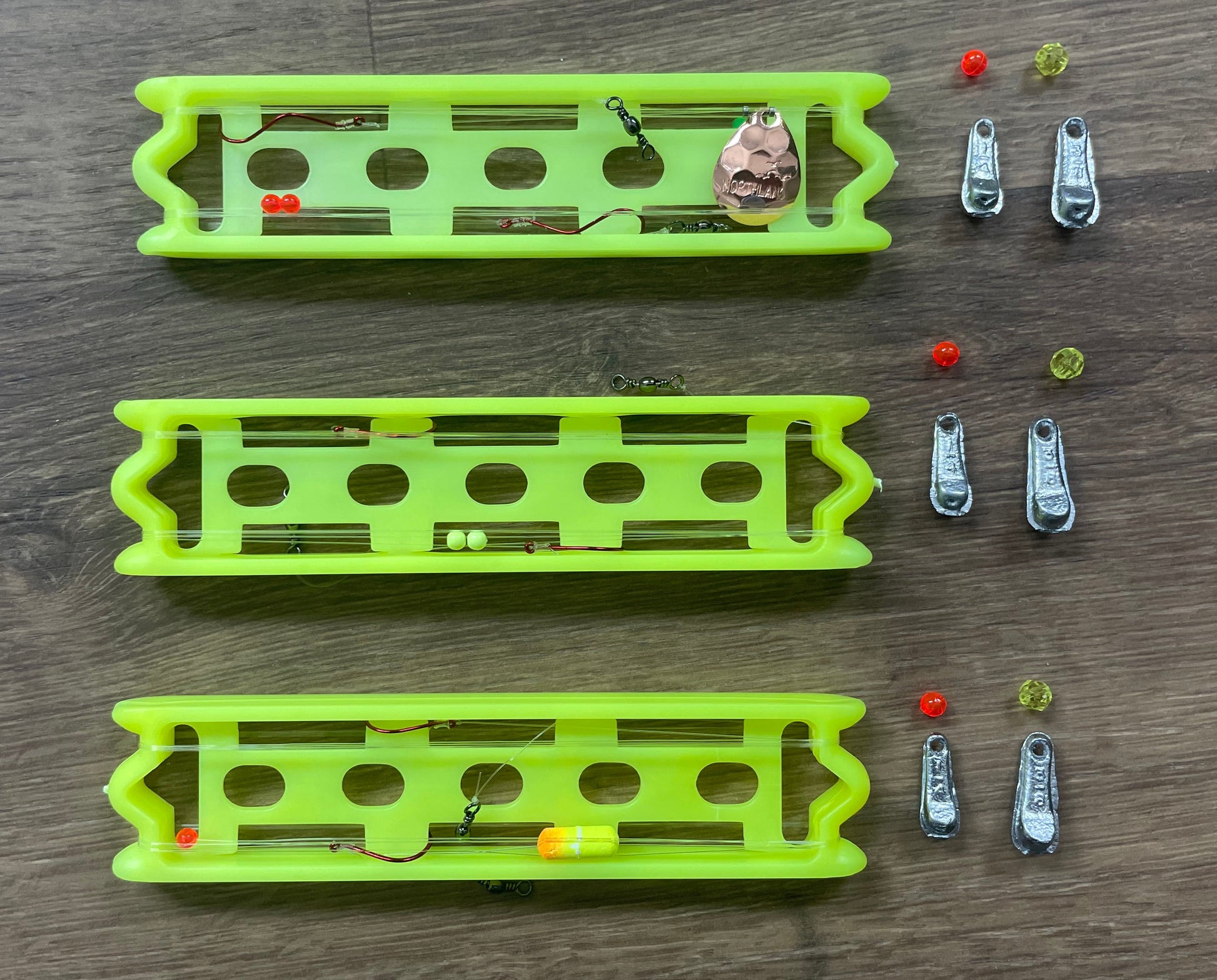 Picture of 6 rigs included in kit (Lindy rigs and worm harnesses) plus walking sinker and bead hardware.