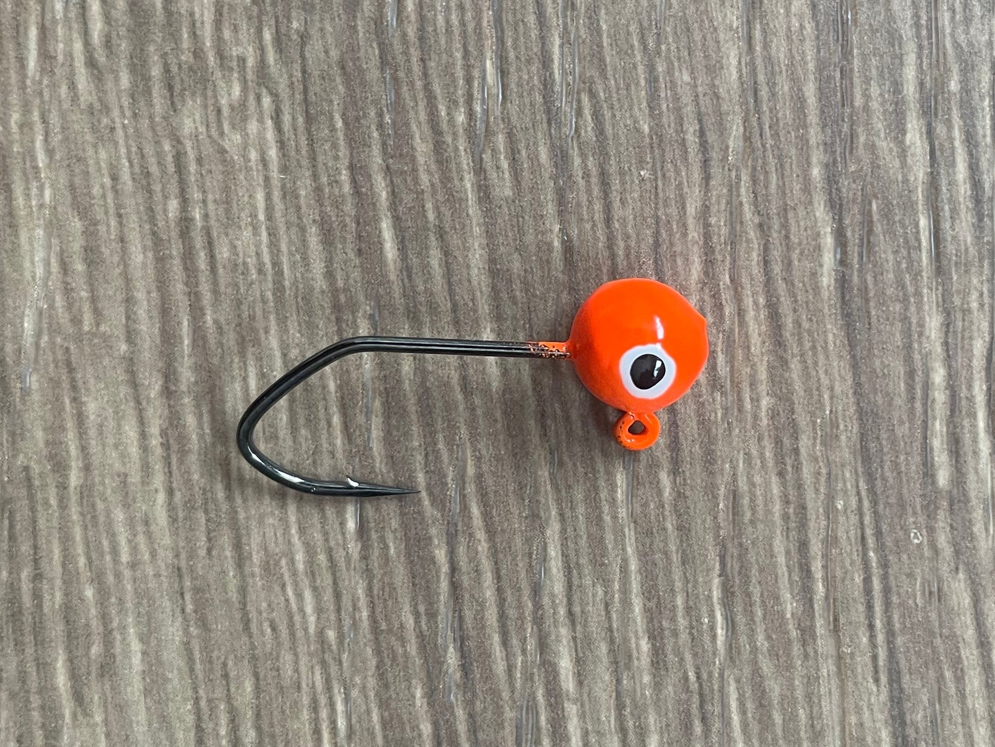 Close-up image of collarless round head jig included in kit